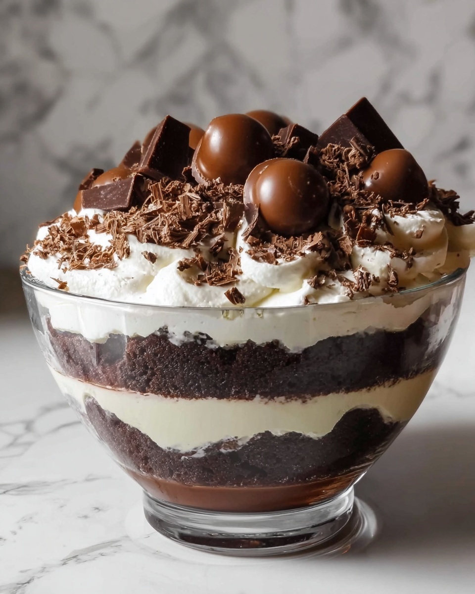Chocolate Trifle with Layers of Cake, Pudding, and Candy Cookies Recipe - Recipe Image